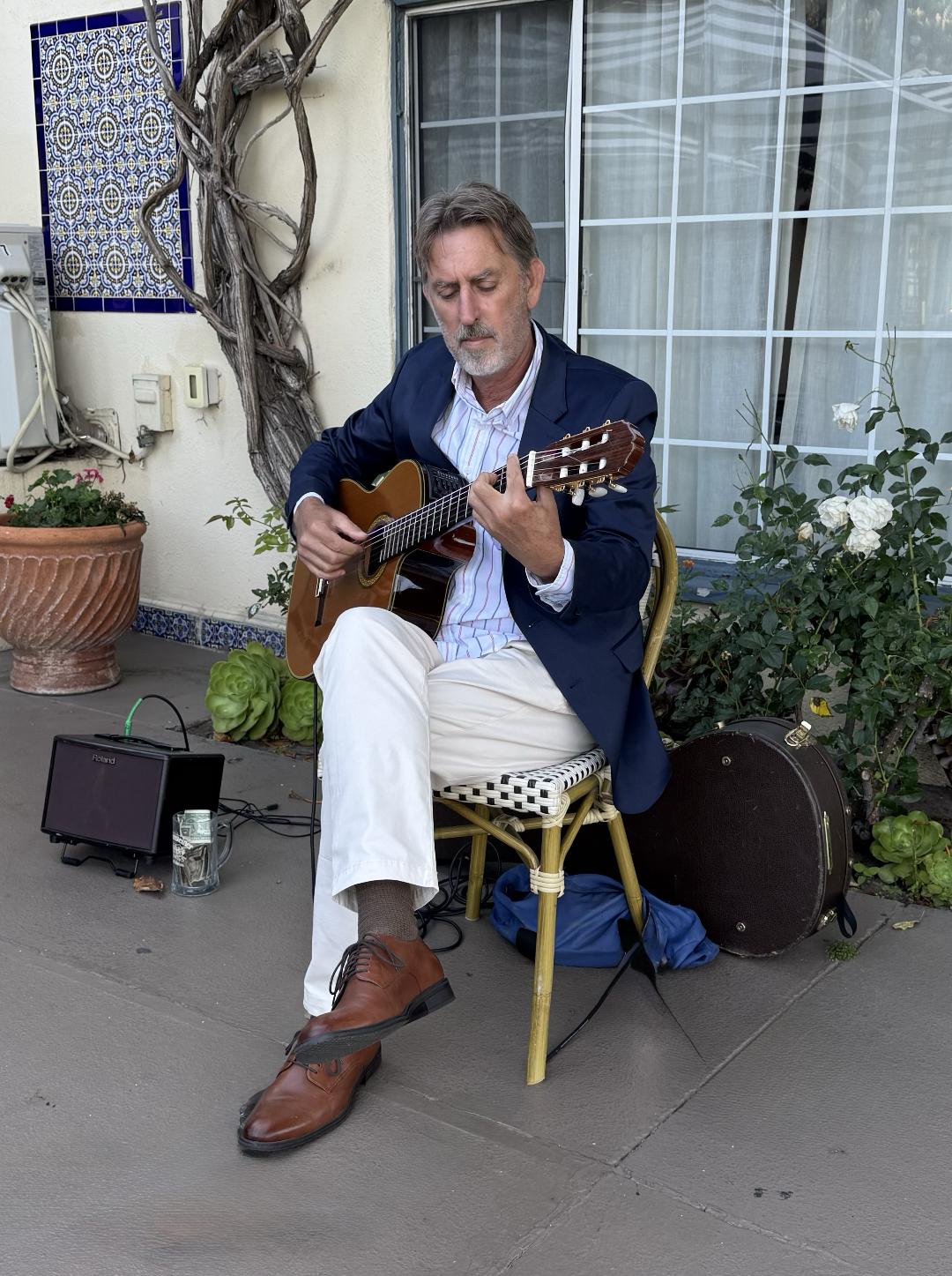 sam-adams-santa-ynez-guitarist-seated-blue-jacket Sam Adams playing guitar at wedding in Santa Ynez, California